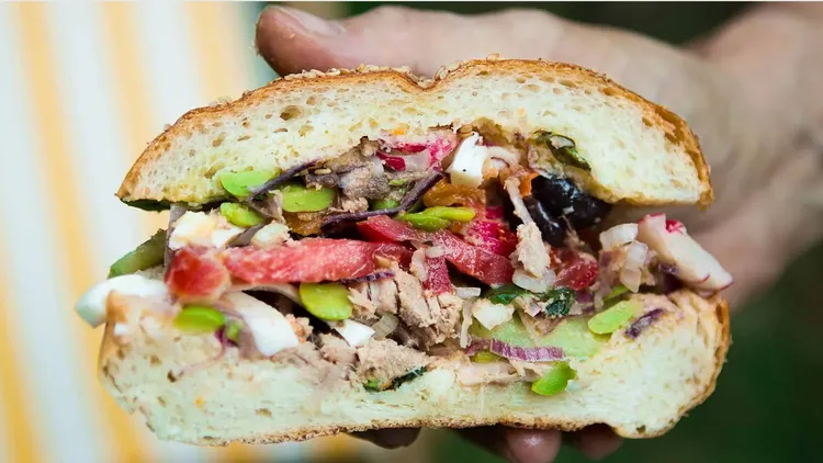 Picnicking during Labor Day weekend? Consider the niçoise pan bagnat, a portable sandwich. Another good choice is ratatouille, a stew celebrating summer ingredients.